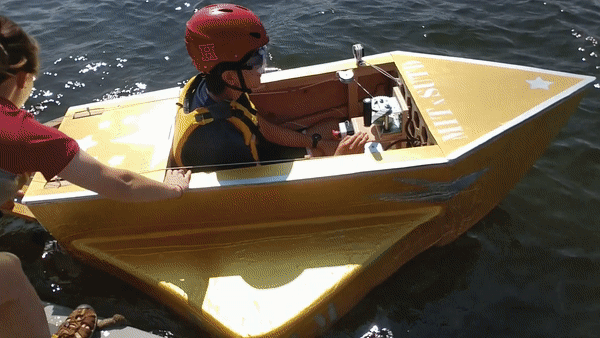 Our boat floating in Charles River, MA